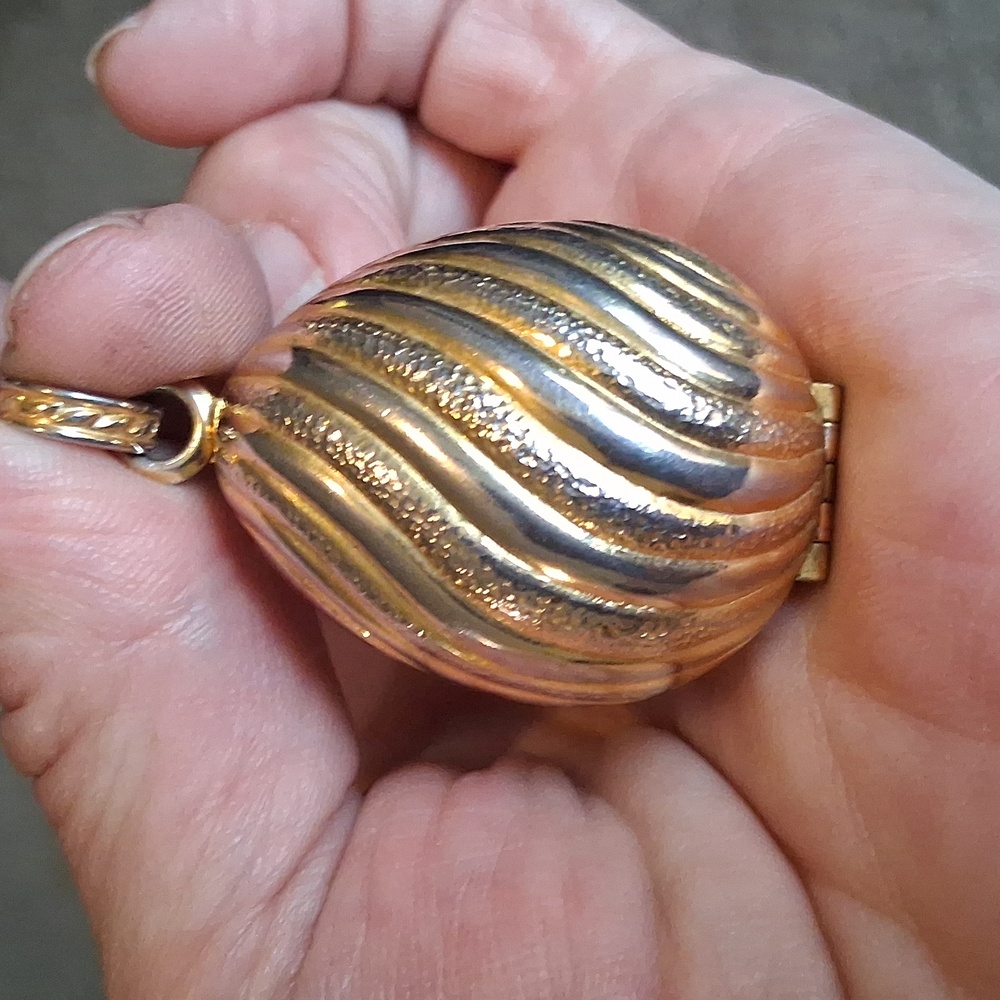 Avon Golden Charmer Locket Pendant 1968 held solid perfume vintage Avon jewelry
